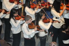 Young musicians performing Steinmetz' "Together" with Amman Symphony Orchestra